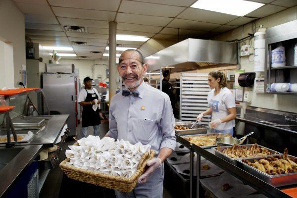 Gregory Bruce in the kitchen of the Food Bank. (Shenghua Sung/The Epoch Times)