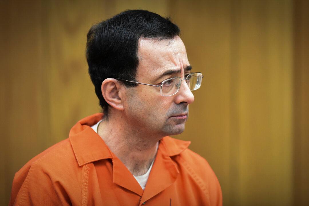 Ex-USA Gymnastics Head Indicted in Texas on Tampering Charge