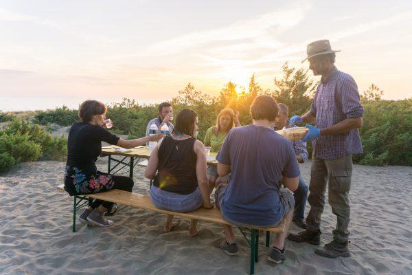 A picnic of local products, enjoyed on a pristine beach in Maremma Park, offers a true taste of the region. (Crystal Shi/The Epoch Times)