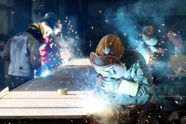Workers cut steel at a factory in Huaibei, Anhui Province, China, on May 3, 2018. (AFP/Getty Images)