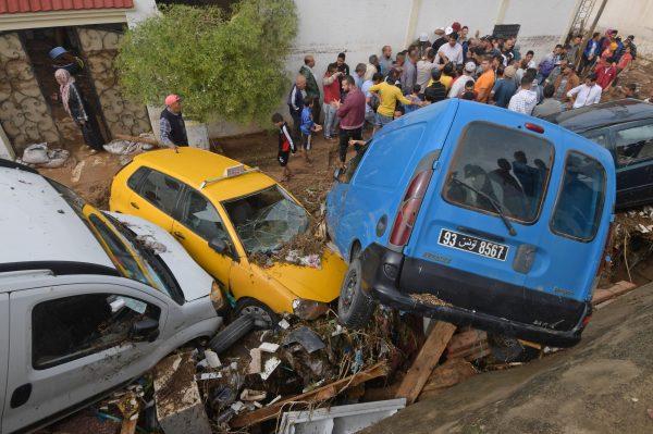 Cars are piled up in a street after being swept away by torrential rains in the city of Mhamdia near the Tunisian capital Tunis on Oct. 18, 2018. (Fethi Belaid/AFP/Getty Images)