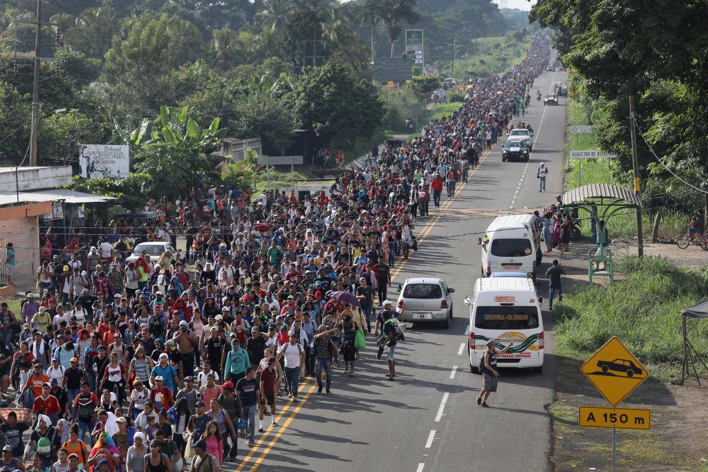 A migrant caravan walks into the interior of Mexico after crossing the Guatemalan border near Ciudad Hidalgo, Mexico on Oct. 21, 2018. (John Moore/Getty Images)