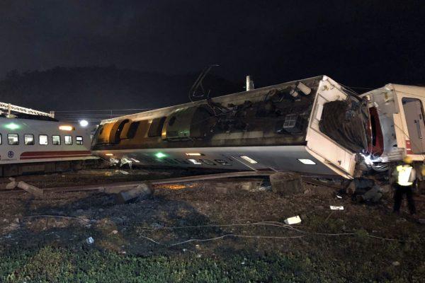 The Puyuma express train was carrying more than 300 passengers toward Taitung, a city on Taiwan's southeast coast, when it went off the tracks on Sunday afternoon in Lian, northern Taiwan, on Oct. 21 2018. (Taiwan Railways Administration via AP)