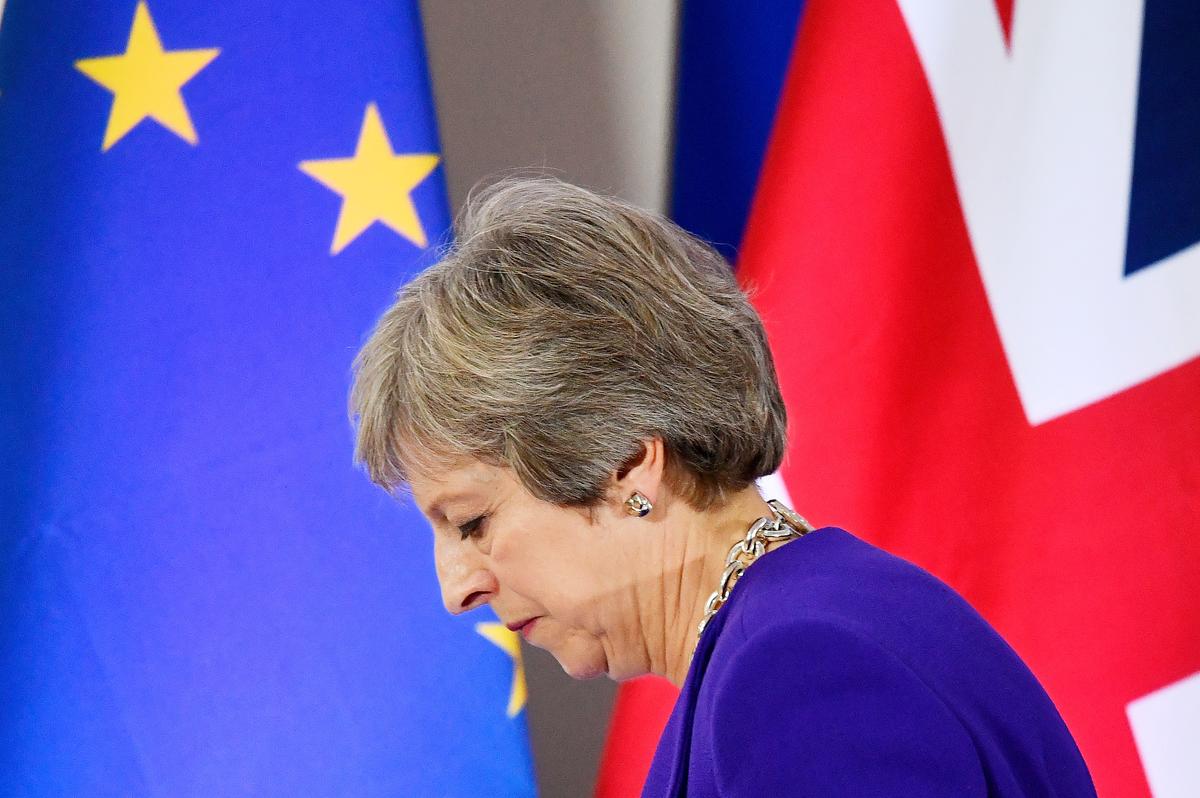 Britain's Prime Minister Theresa May leaves a news conference at the European Union leaders summit in Brussels, Belgium, on Oct. 18, 2018. (Toby Melville/Reuters)