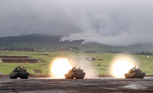 Japanese tanks fire during an annual training session near Mount Fuji west of Tokyo, on Aug. 23, 2018. (Kim Kyung-Hoon/File Photo/Reuters)