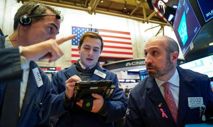 With Market on Edge, Investors Look to Tech Trio