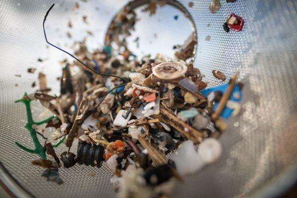 Microplastics are cleaned from a beach in Tenerife, Canary Islands, on July 14, 2018. (Desiree Martin/AFP/Getty Images)