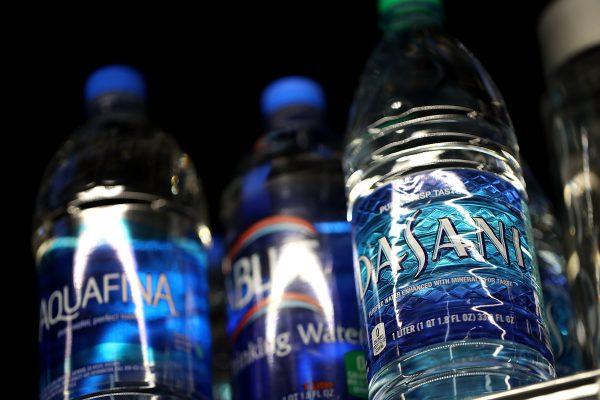 Bottles of water in a convenience store in California on March 16, 2018. Studies have found that 93 percent of water in plastic bottles contains microplastic contamination two times higher than found in tap water. (Justin Sullivan/Getty Images)