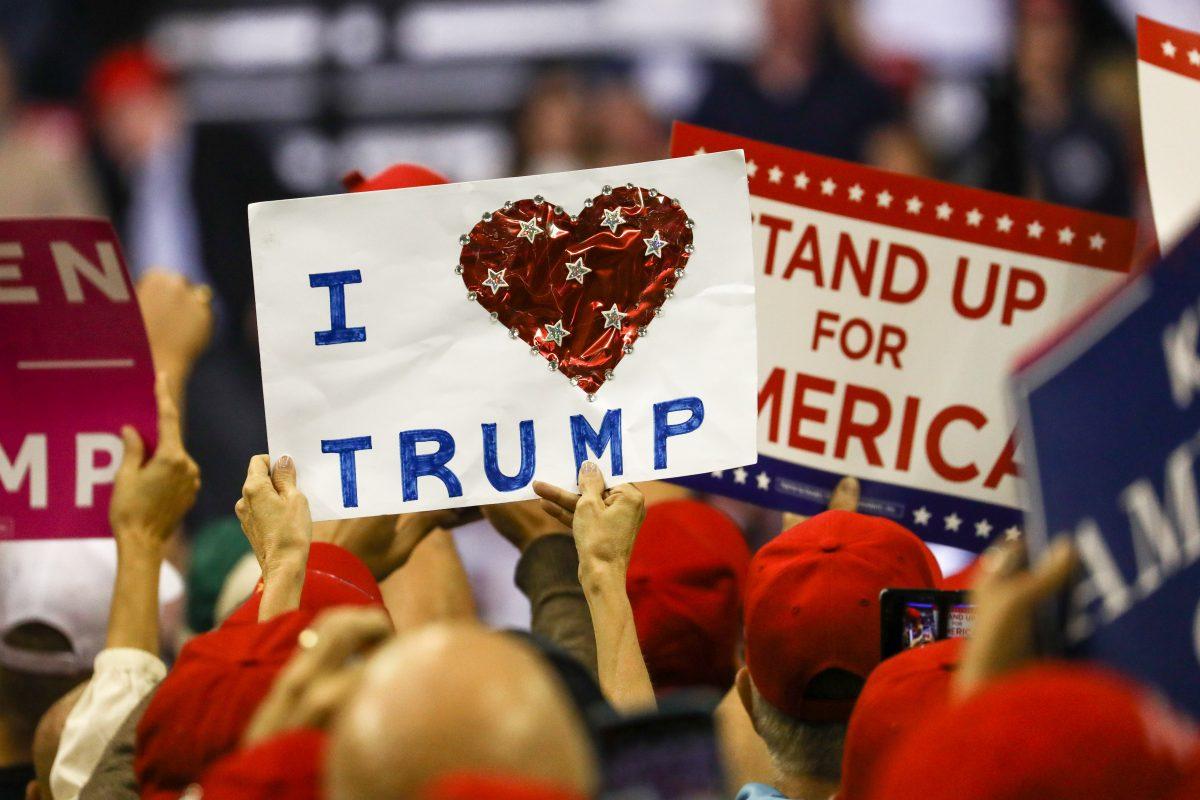 Audience members at a Make America Great Again rally in Houston, Texas, on Oct. 22, 2018. (Charlotte Cuthbertson/The Epoch Times)