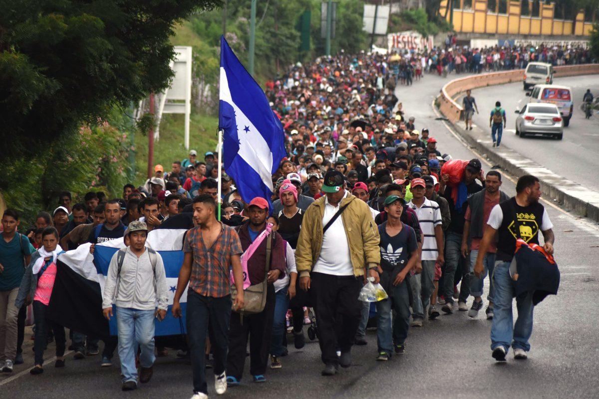 Hondurans and others in a migrant caravan move toward the United States in Chiquimula, Guatemala on Oct. 17, 2018. (Orlando Estrada/AFP/Getty Images)