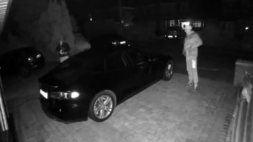 A Tesla owner shared a video of his Tesla Model S being stolen from outside his home and the way the thieves were able to gain access to the vehicle highlights a security flaw, he said. The theft occurred in Essex, the United Kingdom, on Oct. 21, 2018. (Anthony Kennedy via Storyful)