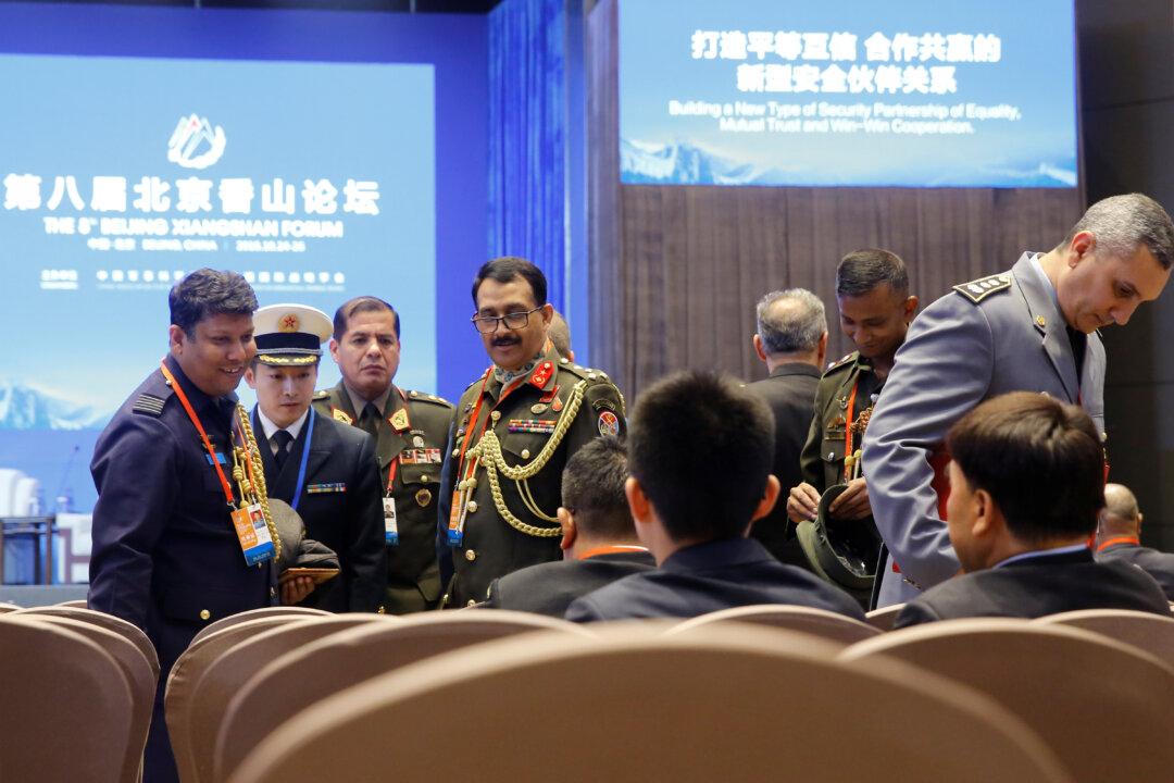 China Says Military Will Act ‘At Any Cost’ to Prevent Taiwan Split