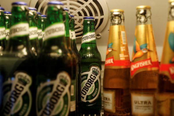 Bottles of Kingfisher and Tuborg beer are displayed in a fridge at a pub in Mumbai, India, October 20, 2018. Picture taken on Oct. 20, 2018. (Danish Siddiqui/Reuters)