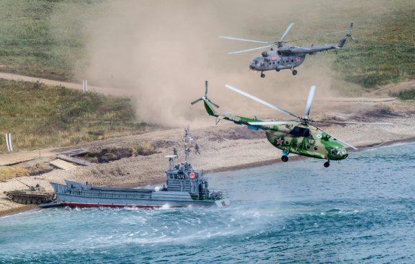 Russian military forces perform a landing during the Vostok-2018 (East-2018) military drills at Klerka training ground on the Sea of Japan coast, outside the town of Slavyanka, on Sept. 15, 2018. (Mladen Antonov/AFP/Getty Images)