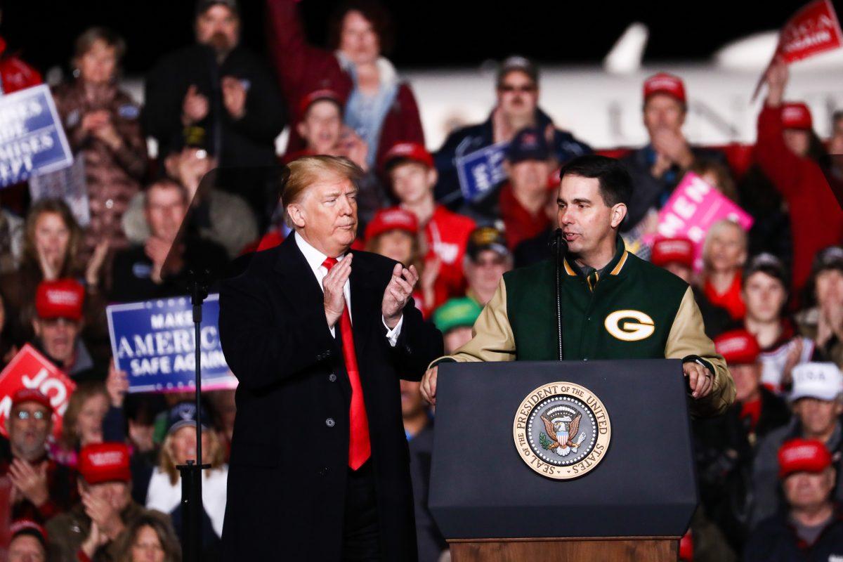 President Donald Trump and Wisconsin Gov. Scott Walker at a Make America Great Again rally in Mosinee, Wis., on Oct. 24, 2018. (Charlotte Cuthbertson/The Epoch Times)