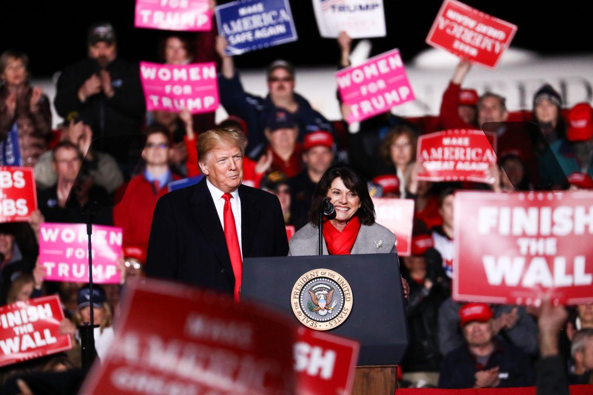President Donald Trump and GOP Senate candidate Leah Vukmir at a Make America Great Again rally in Mosinee, Wis., on Oct. 24, 2018. (Charlotte Cuthbertson/The Epoch Times)
