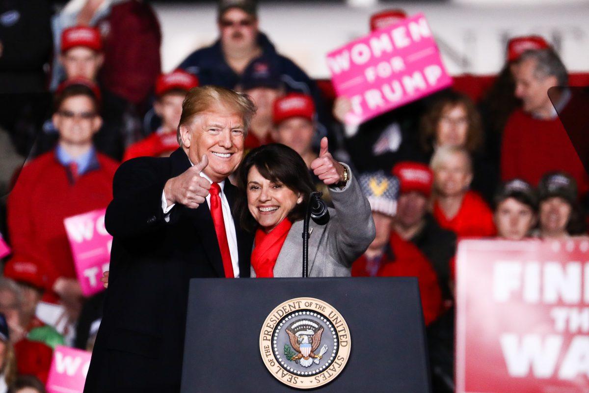 President Donald Trump and GOP Senate candidate Leah Vukmir at a Make America Great Again rally in Mosinee, Wis., on Oct. 24, 2018. (Charlotte Cuthbertson/The Epoch Times)
