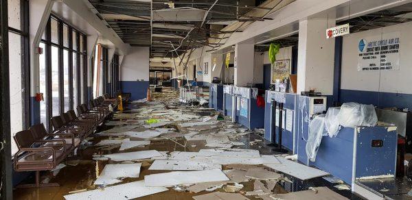 Ceiling panels and other debris cover the ground inside Saipan International Airport after Super Typhoon Yutu hit the Northern Mariana Islands, U.S., on Oct. 25, 2018. (Brad Ruszala/Reuters)