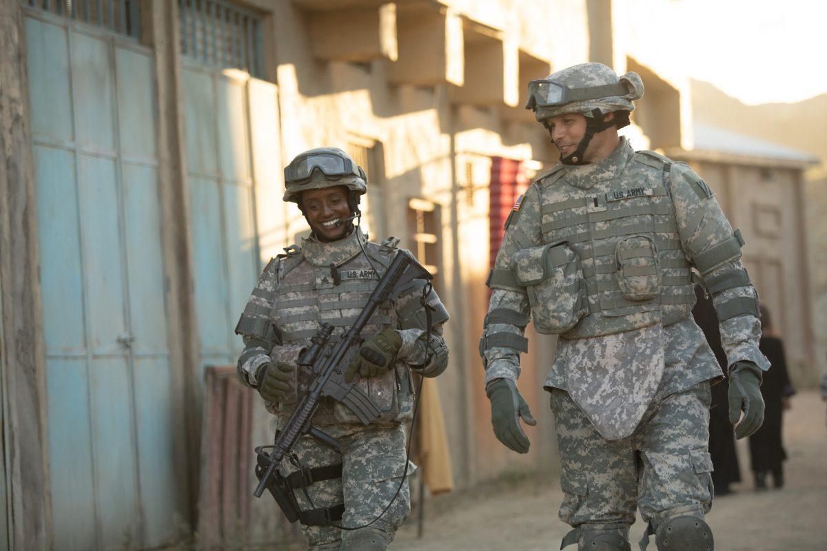 Shonda Peterson (Skye P. Marshall) and Chaplain Darren Turner (Justin Bruening) share a lighthearted moment on foot patrol in Iraq, in “Indivisible.” (Provident Films LLC/The WTA Group, LLC)