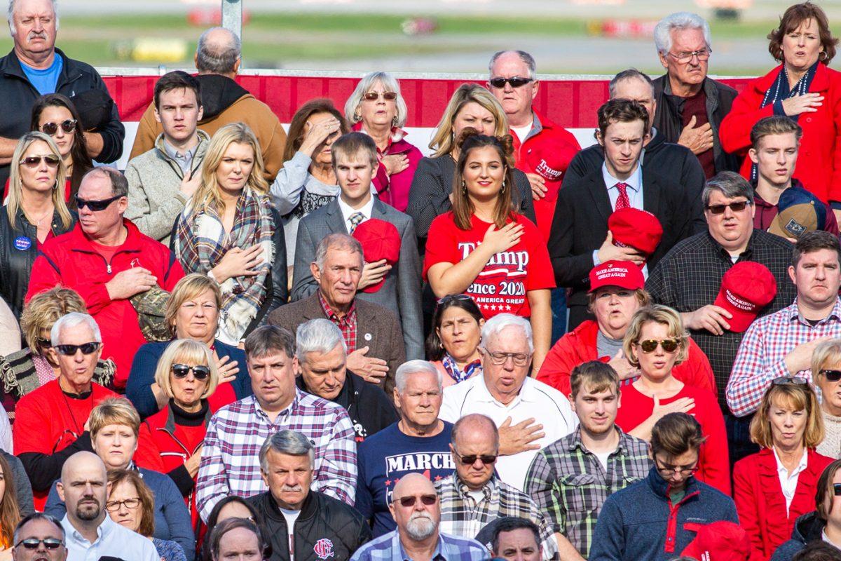 Attendees recite the Pledge of Allegiance at a Make America Great Again rally in Murphysboro, Ill., on Oct. 27, 2018. (Hu Chen/The Epoch Times)