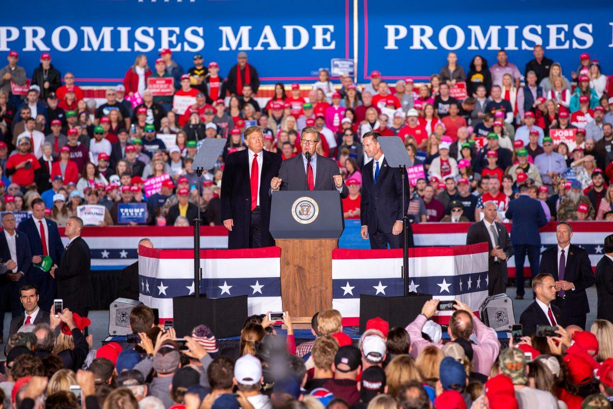 (L-R) President Donald Trump, Rep. Randy Hultgren (R-Ill.), and Rep. Rodney Davis (R-Ill.) at a Make America Great Again rally in Murphysboro, Ill., on Oct. 27, 2018. (Hu Chen/The Epoch Times)
