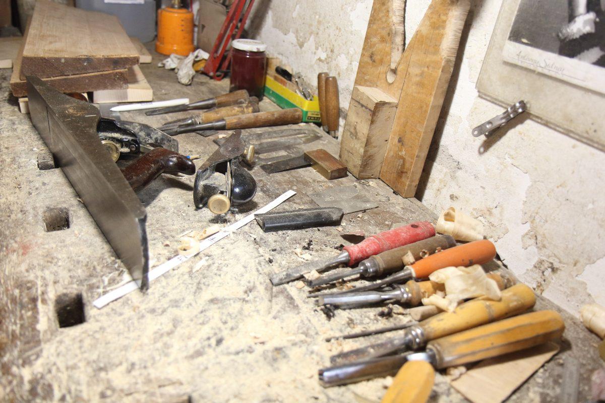 The workbench where Jamie Lazzara creates her fine stringed instruments using traditional techniques and hand tools. (Lorraine Ferrier/The Epoch Times)