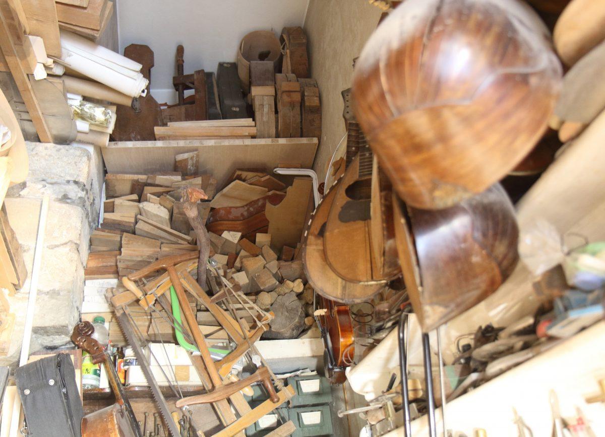Violin wood collected over 40 years is stored at the back of Jamie Lazzara's workshop. Some of wood is 100 years old. (Lorraine Ferrier/The Epoch Times)