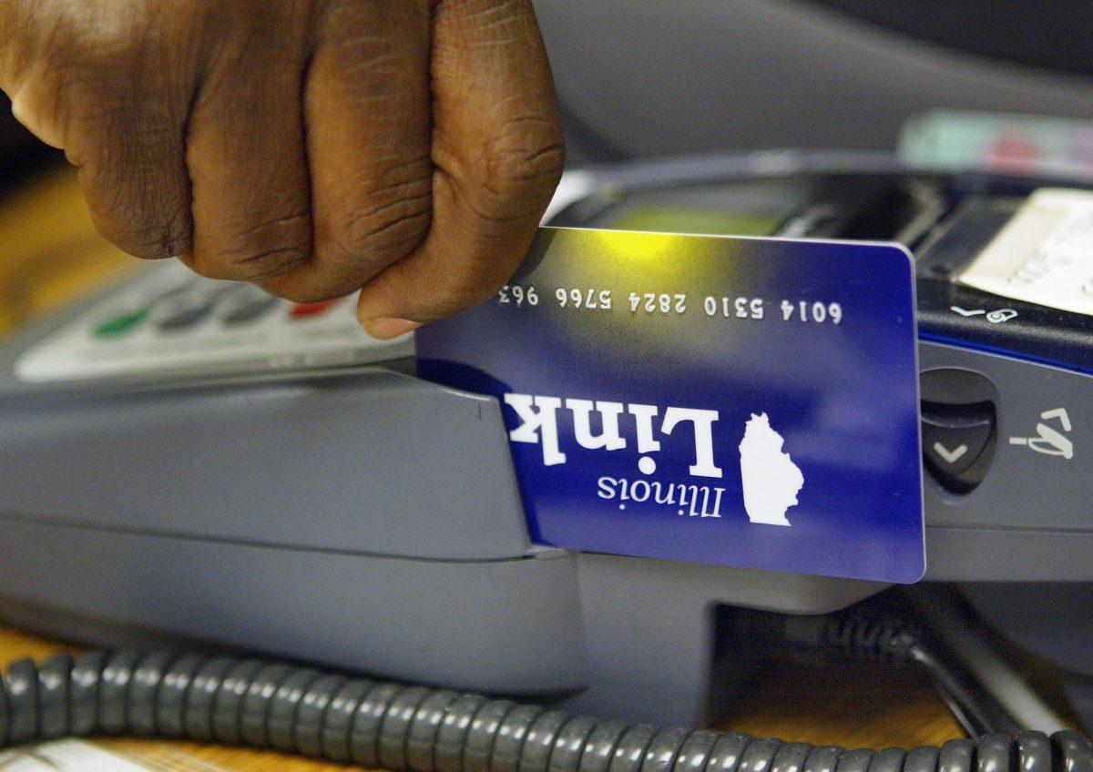 An Illinois Link card, an electronic debit-like card used to draw on food stamp benefits in Skokie, Ill., on June 24, 2004. (Tim Boyle/Getty Images)