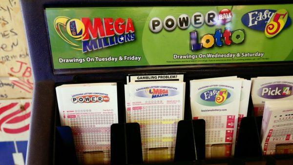 Lottery forms for Louisiana Mega Millions, Powerball and other lottery games fill the drawer at The World Bar and Grill, in Delta, La., on Oct. 23, 2018. (Rogelio V. Solis/AP)