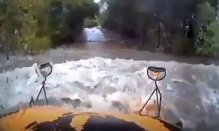 Dashcam Video: School Bus Driver Tries to Enter Flooded Road, Gets Swept