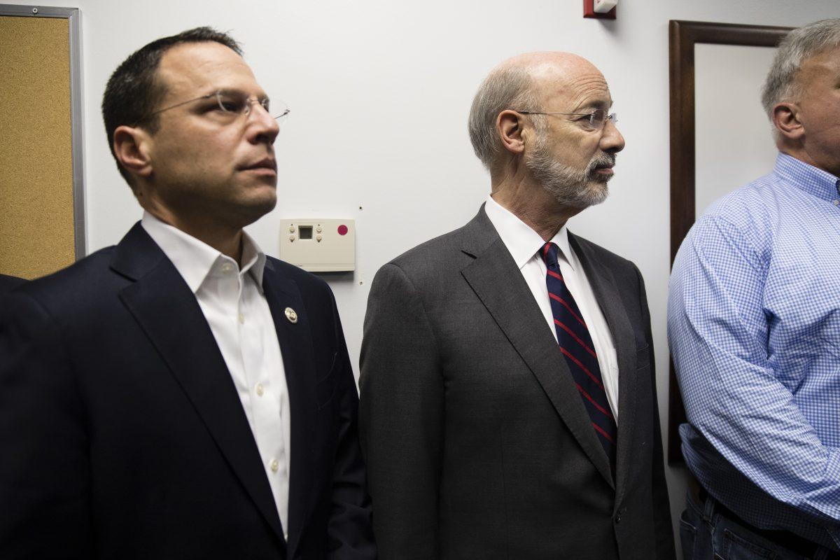 Pennsylvania Gov. Tom Wolf, right, and Attorney General Josh Shapiro, attend a news conference in Pittsburgh, Pa., on Oct. 28, 2018. (Matt Rourke/AP Photo)