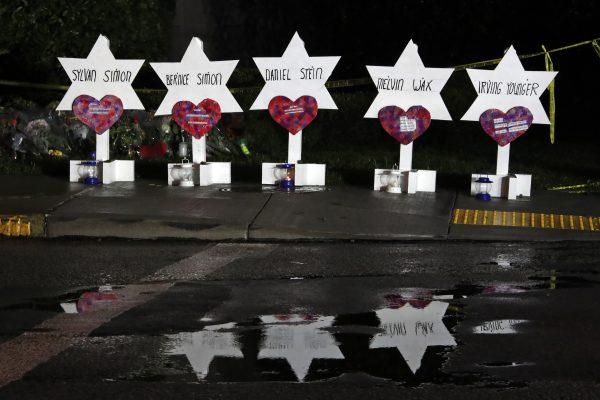 This photo shows some of Stars of David with names of those killed at the Tree of Life Synagogue in Pittsburgh in Saturday's shooting, at a memorial outside the synagogue, on Oct. 28, 2018. (Gene J. Puskar/AP)