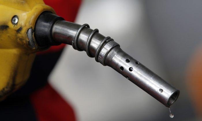Oil Prices Down More Than $1 on Rising Supply, Trade War