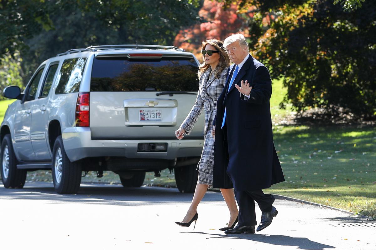 President Donald Trump and First Lady Melania Trump depart the White House in Washington on Oct. 30, 2018. They traveled to Pittsburgh to pay their respects at a synagogue where 11 people were shot on Oct. 27. (Holly Kellum/NTD)