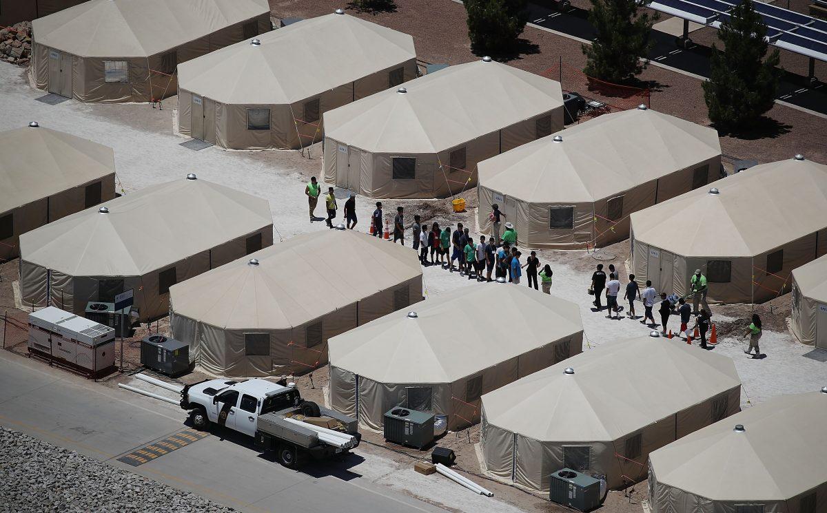 Children and workers on June 19, 2018, at a tent encampment recently built near the Tornillo Port of Entry in Texas. The Trump administration is using the Tornillo tent facility to house immigrant children separated from their parents after they were caught entering illegally. (Joe Raedle/Getty Images)