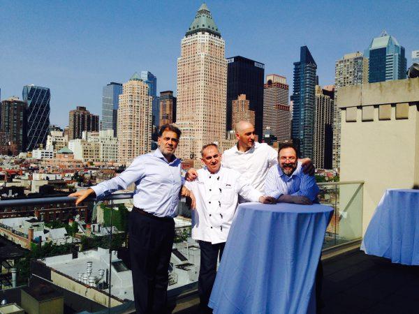 Gianfranco Sorrentino (L) standing next to executive chef Vito Gnazzo and two colleagues. (Courtesy of Alisha Zaveri)