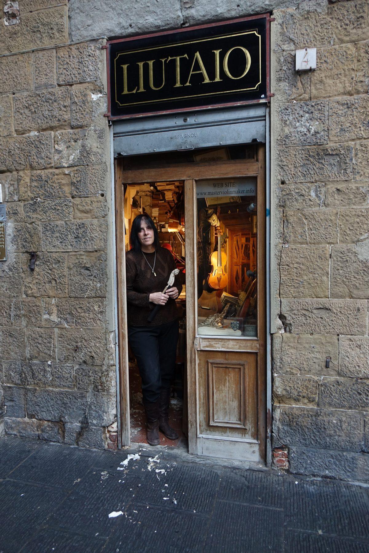 Master violin-maker and restorer of fine stringed instruments Jamie Lazzara in the doorway of her workshop in Florence on Oct. 30, 2018. (Paolo Boni)