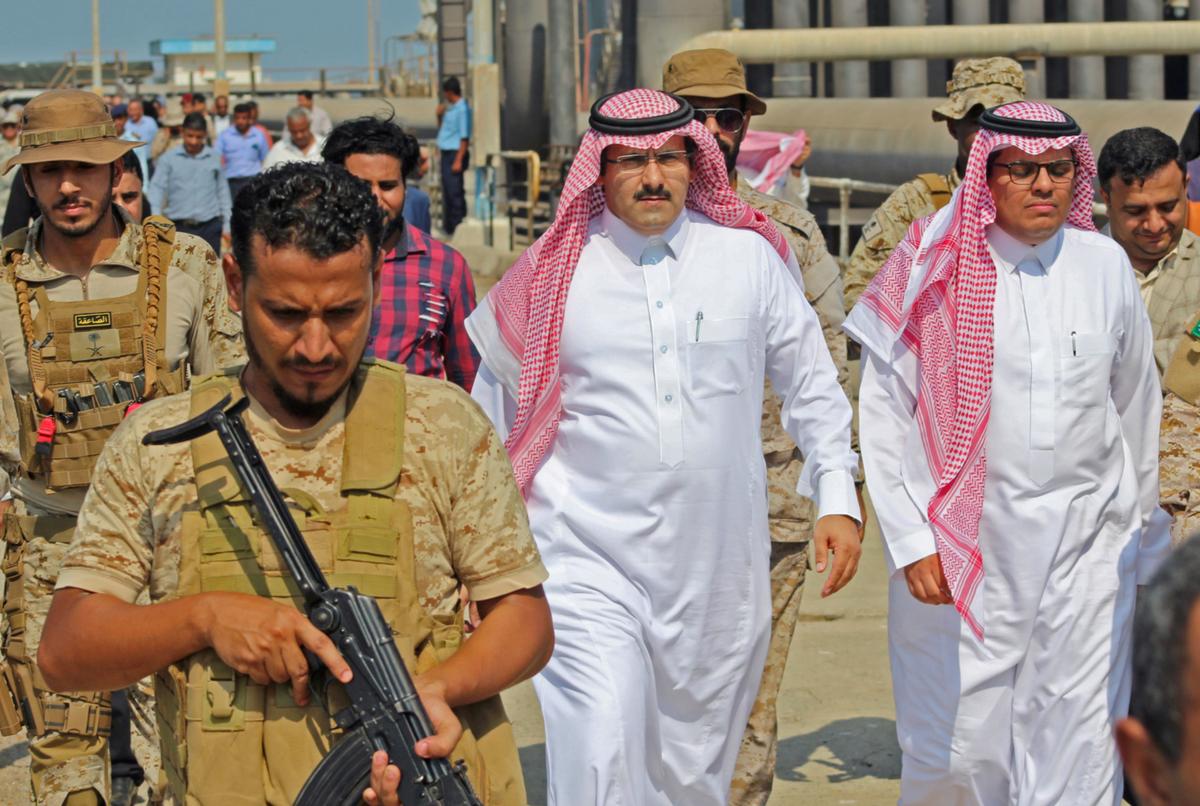 Saudi ambassador to Yemen Mohammed Said Al-Jaber (C) arrives in the southern Yemeni port of Aden to oversee an aid delivery of fuel from Saudi Arabia on Oct. 29, 2018. (Saleh Al-Obeidi/AFP/Getty Images)
