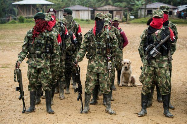 Members of the National Liberation Army (ELN) guerrilla receive instructions on Nov. 21, 2017, in the banks of the San Juan river, department of Choco, Colombia. (Luis Robayo/AFP/Getty Images)