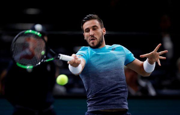 Bosnia and Herzegovina's Damir Dzumhur in action during his third round match against Serbia's Novak Djokovic at Tennis ATP 1000 Paris Masters in AccorHotels Arena, Paris, France, on Nov. 1, 2018. (Gonzalo Fuentes/Reuters)