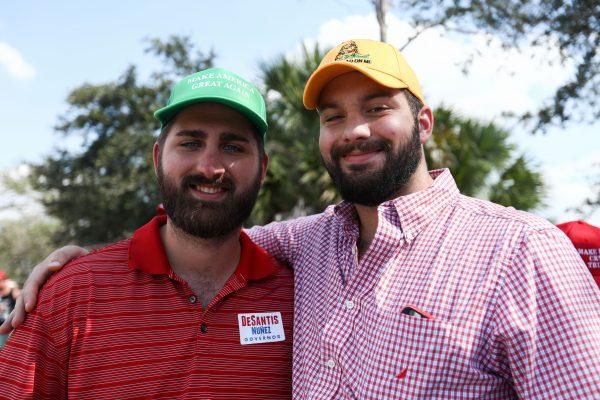 Brothers Ryan (L) and Dylan Kren before a Make America Great Again rally in Charlotte, N.C., on Oct. 26, 2018. (Charlotte Cuthbertson/The Epoch Times)