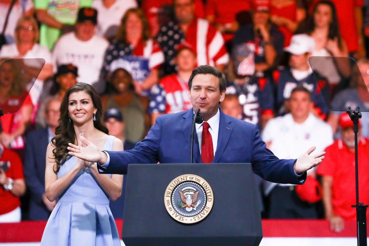 Florida GOP gubernatorial candidate Ron DeSantis and his wife at a Make America Great Again rally in Fort Myers, Fla., on Oct. 31, 2018. (Charlotte Cuthbertson/The Epoch Times)