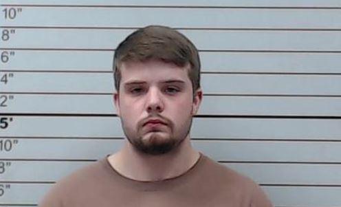 Hunter Newman, 22, allegedly struck a 9-year-old boy in Mississippi as the child crossed a highway to board a school bus on Oct. 30, 2018. Newman was arrested and charged with aggravated assault. (Lee County Jail)