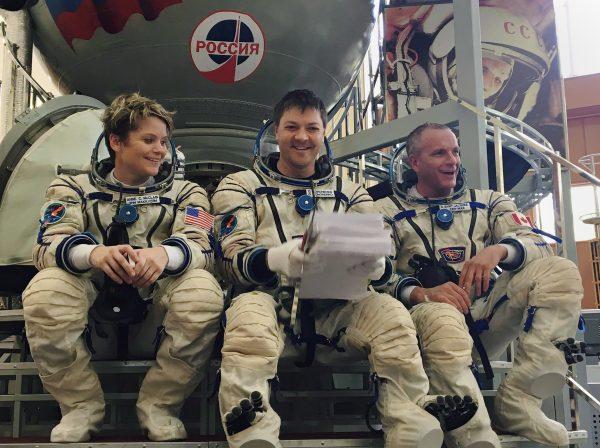 (L-R) Astronauts Anne McClain, Oleg Kononenko, and David Saint-Jacques at the Gagarin Cosmonaut Training Center in Star City, Russia, on Aug. 17, 2018. (Melanie Marquis/THE CANADIAN PRESS)