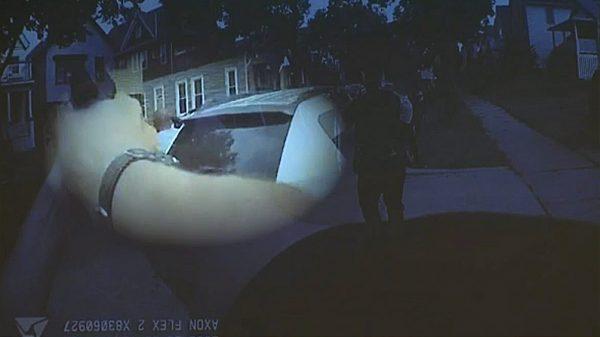 The highlighted portion of this screen shot shows Mario Hobson holding his pistol to his head. (Milwaukee Police Department/Fox News screenshot)