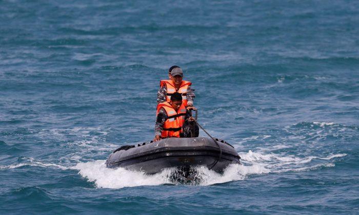 Senior Indonesian Rescue Diver Dies in Jet Crash Search