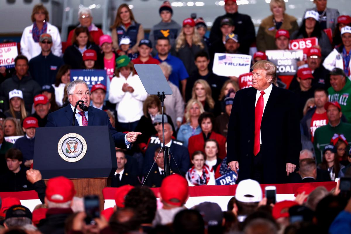 GOP Senate candidate Patrick Morrisey and President Donald Trump at a Make America Great Again rally in Huntington, W.Va., on Nov. 2, 2018. (Charlotte Cuthbertson/The Epoch Times)