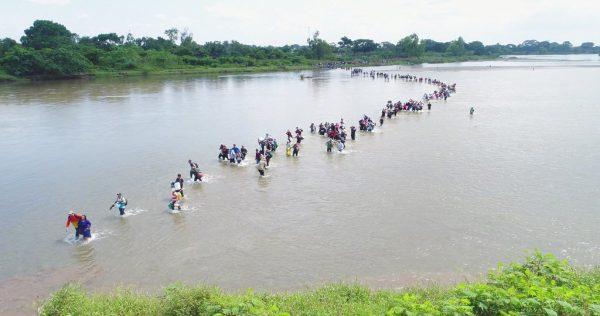 The fourth migrant caravan crossed the Suchiate River into Mexico on Nov. 2, 2018. (AP Photo/Oscar Rivera)