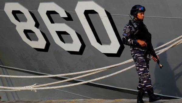 An Indonesian navy soldier walks near KRI Torani during the rescue operation of Lion Air flight JT610 at Tanjung Priok port in Jakarta, Indonesia, on Nov. 4, 2018. (Beawiharta/Reuters)