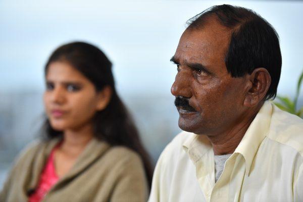 Ashiq Mesih (R) and Eisham Ashiq, the husband and daughter of Asia Bibi, speak during an interview with AFP in London, on Oct. 12, 2018. (Ben Stansall/AFP/Getty Images)